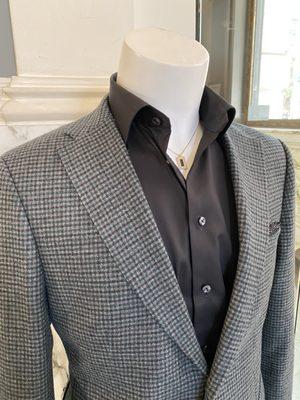 Tad Williams of London blazer, Eton dress shirt and Mission Atelier necklace.