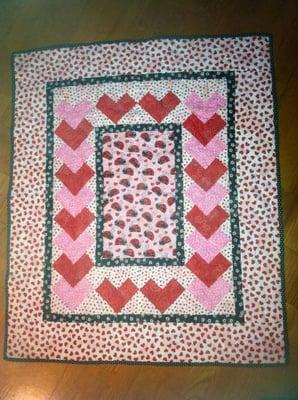 Baby blanket quilted for me by Quilt Me A Story in Humble, TX.