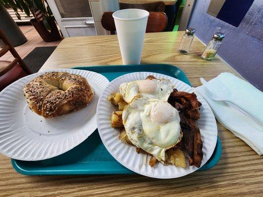 Crispy bacon, eggs, and toasted everything bagel with butter!