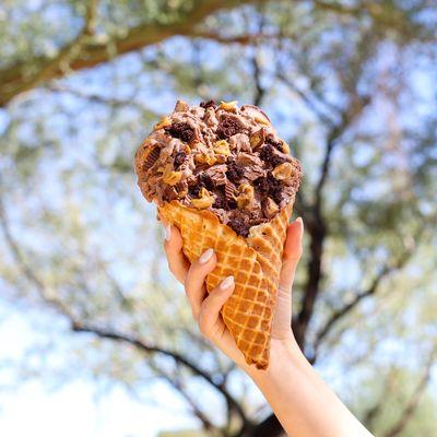 Cold Stone Ice Cream in a waffle cone.