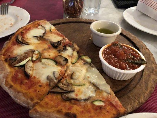 Pizza Ortolana 17.00  Mozzarella cheese, tomato sauce, grilled zucchini, eggplant and mushroom.