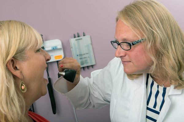 Katie Vanderlaan, PA, with patient