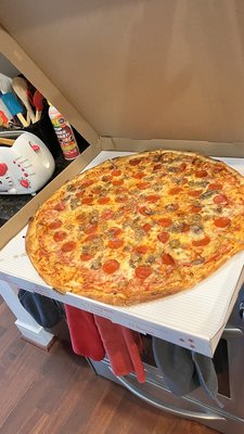 Pepperoni and sausage on a 24" pizza. Its HUGE!