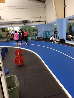 heavy weighs side of the track facing the racquet ball, squash courts, indoor golf course and the group exercise rooms.