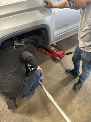 mechanics checking truck