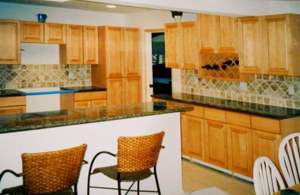 Granite kitchen remodel with backsplash