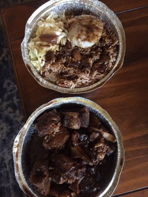 Oxtails and gravy with rice, cabbage and dumpling