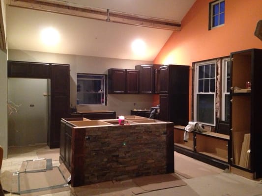 Kitchen is coming along they are working on concrete counters to make it complete