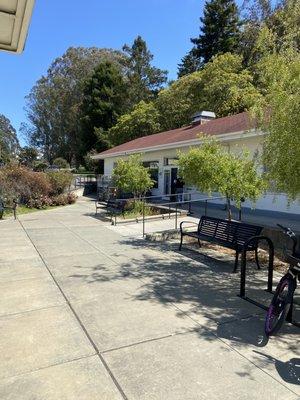 Presidio Post Office with seats to chill and places to secure bikes