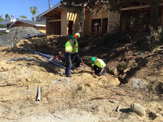 BPI Plumbing training Job Corps traineese at a construction project in Pacific Beach