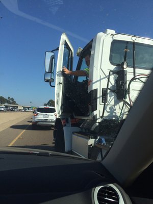 Notice how he has swerved into my lane in order to block my car, and essentially force me off the road.