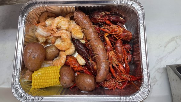 Crawfish, shrimp, sausage, corn and potatoes.