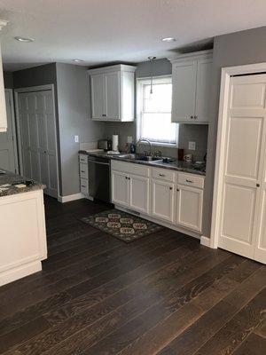 Cabinets, tops and hardwood.  grey is in!