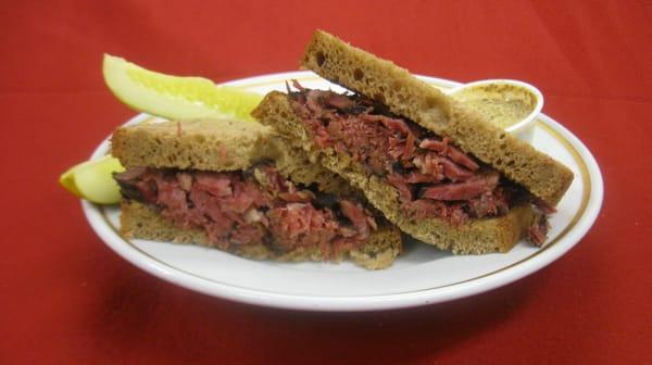 Signature Sandwich at the Midtown Deli Cafe- Pastrami Stacked high on rye. Only $5.95