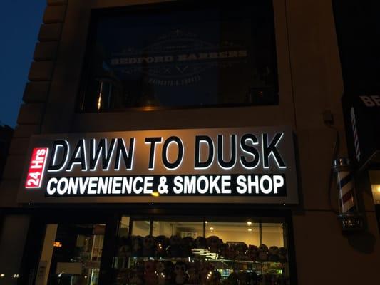 new bodega in the hood. what kind of genius names a 24 hour bodega "dawn to dusk"?