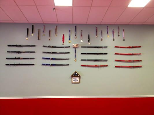 Some of our students medals won at competitions and swords won at NAGA tournaments.