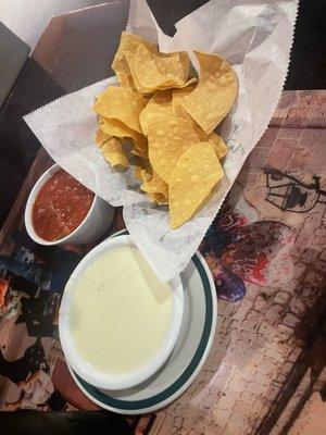 Chips, cheese dip and salsa