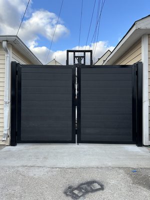 6' high custom horizontal composite with metal posts/ metal frame gates.