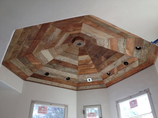 Custom dome ceiling built with reclaimed wood