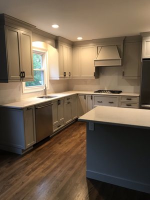 Expanded kitchen with removal of a wall and addition of an work island...LOVE the open concept and extra space!!