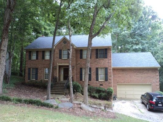 We raised the tree canopy. Air can freely move around the house and the sun can help dry out constant moisture