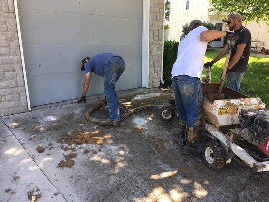 Pumping up a driveway using Mudjacking slurry