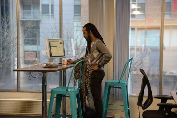 Main workspace at standing height tables