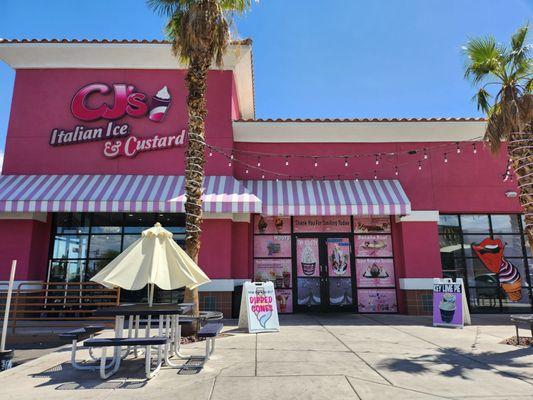 Store front (entrance in the middle, behind the soft serve posters).