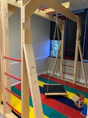 Monkey bars and swing in Sensory Gym