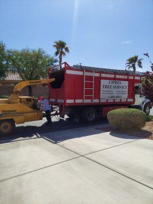 Company truck and wood chipper