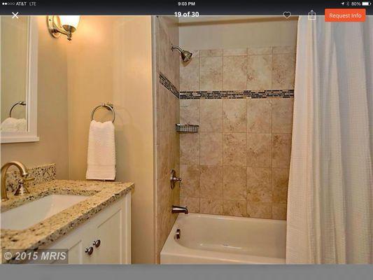 A little touch of accent tile can dress up a shower without seeming "over the top"