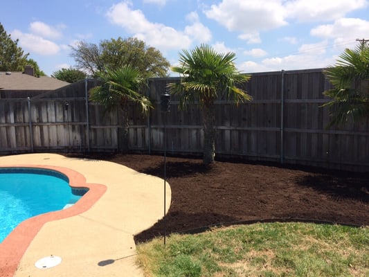 Weed removal/treatment and fresh mulch.