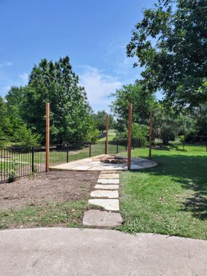 Flagstone sunk into grass to provide pathway