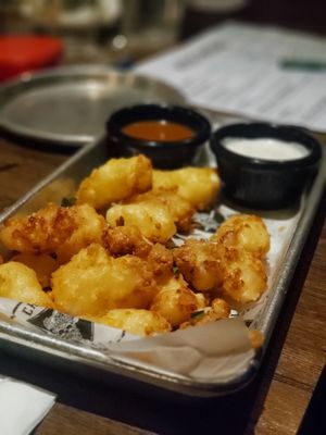 Wisconsin Cheese Curds  Divine bites of delicious cheesy goodness.....