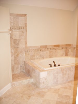 Naperville limestone master bathroom.