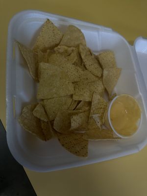 Here's how the chips and queso were served to me you can see no chips were eaten and there is just residue essentially in the cup