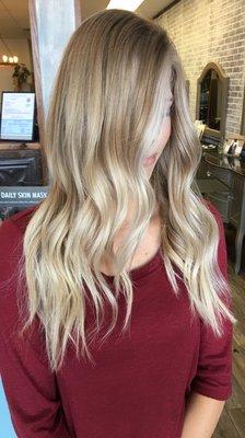 Partial balayage with crown babylights for brightness around the face.