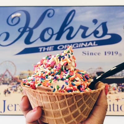 chocolate vanilla twist w/ rainbow sprinkles in a waffle bowl