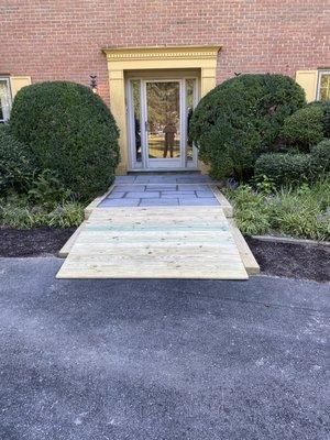 New concrete paver walkway with handicap ramp.