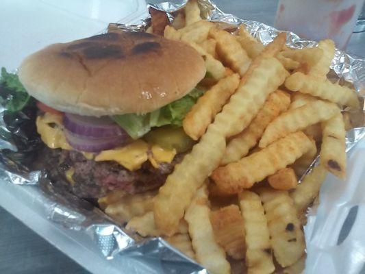 Double burger w/ bacon, cheese and everything else. That's the top 2/3's of the burger. There is another patty underneath.  Wow!