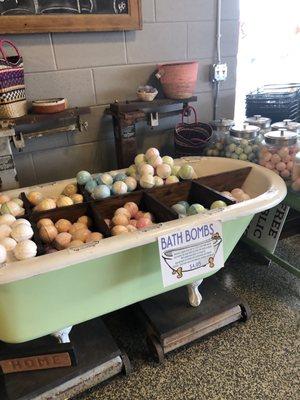 Cute display of bath bombs in claw foot tub - October 2021