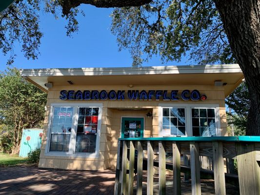 Seabrook Waffle Co. building with outdoor sitting.