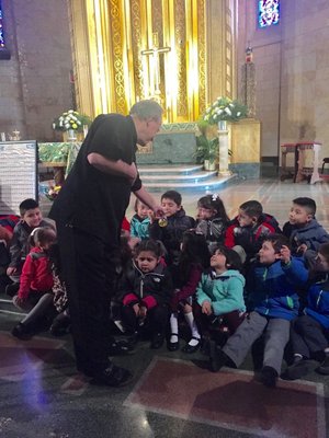 Preschool learns about the Holy Sacrament of Initiation, for many it is a revisit of their own Baptism .