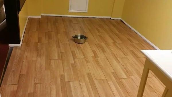 After pic of laminate hardwood flooring job she was a happy customer!!