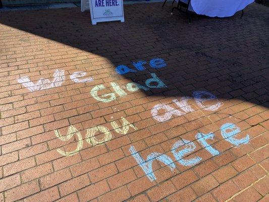 A chalk drawing showing the welcoming presence.