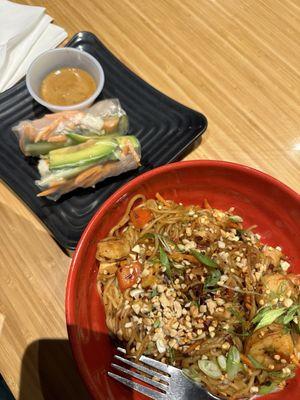 Pad Thai w/ Chicken and spring rolls.