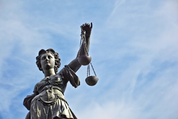 Lady Justice is standing tall in this photo.  Let Calcagno and Associates help you stand tall through your legal matter
 Call 1(800)WE-FIGHT