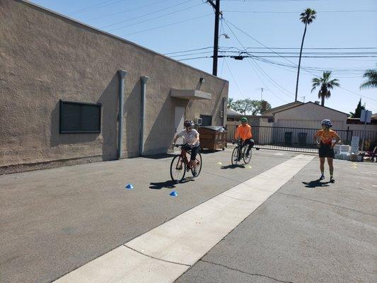 Teaching during a Metro bike class. Parking lot drills.