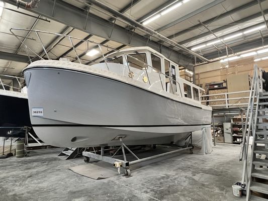 Silver hull tug styled trawler