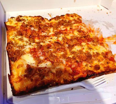 Detroit style cheese pizza with sausage